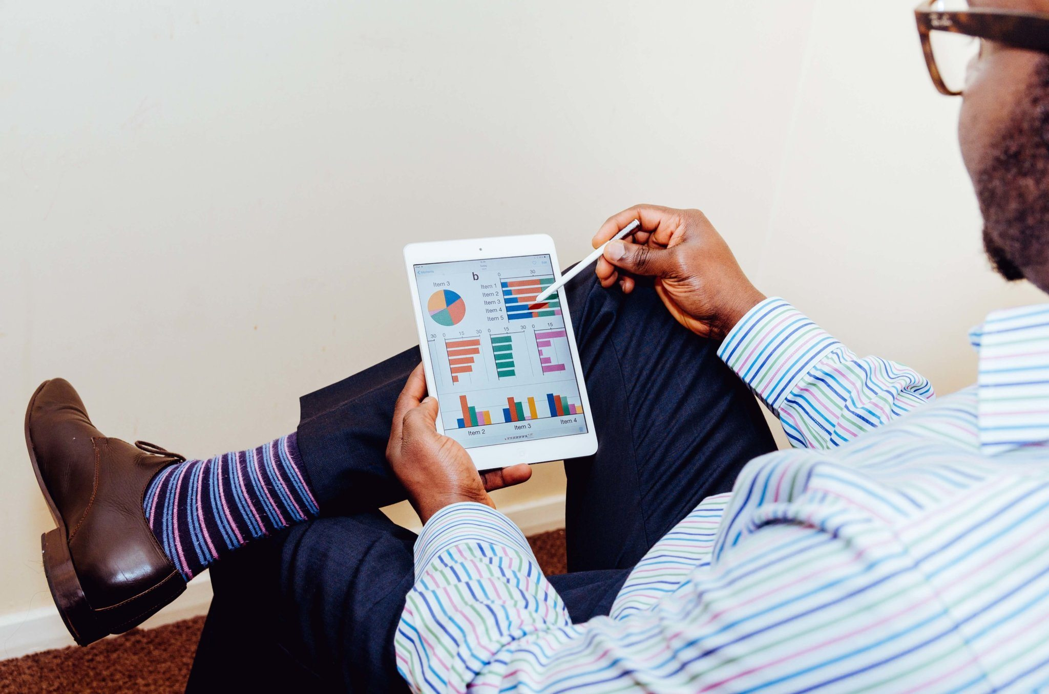 Canva - Man Wearing White and Blue Pinstriped Dress Shirt Holding White Ipad